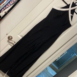 Black jumpsuit with white trim